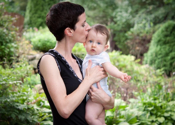 Mother and baby boy photographed by Jennifer Jule Studios in a garden near Waterford, VA.